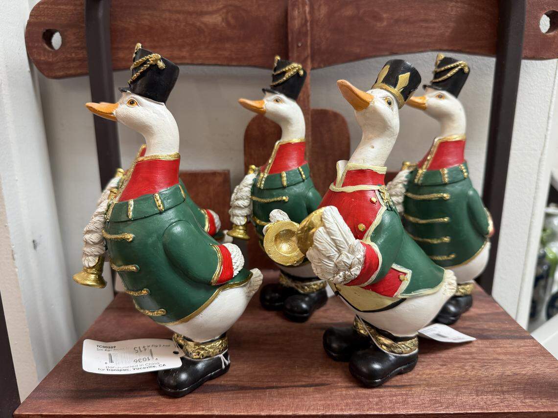 Christmas-themed decorative duck pieces are displayed at The Perfect Piece in downtown Cary on Wednesday, Nov. 6, 2025.