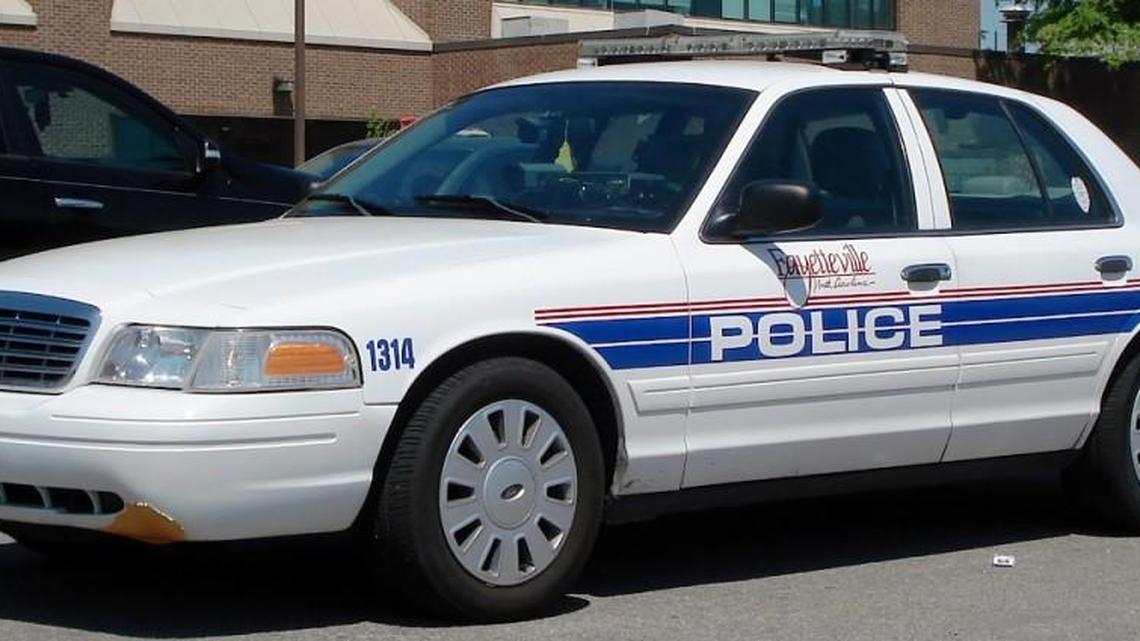 A photo of a 2007 model Ford Crown Victoria police interceptor from the Fayetteville Police Department.