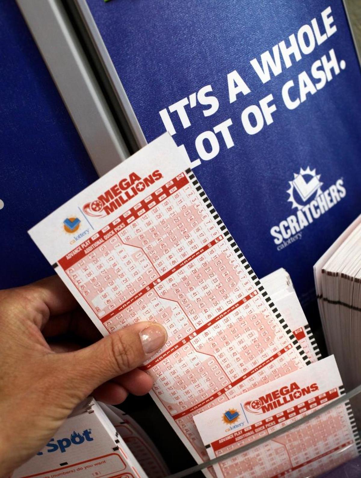 A customer pickets up a lottery ticket in Palo Alto, Calif., in 2012.