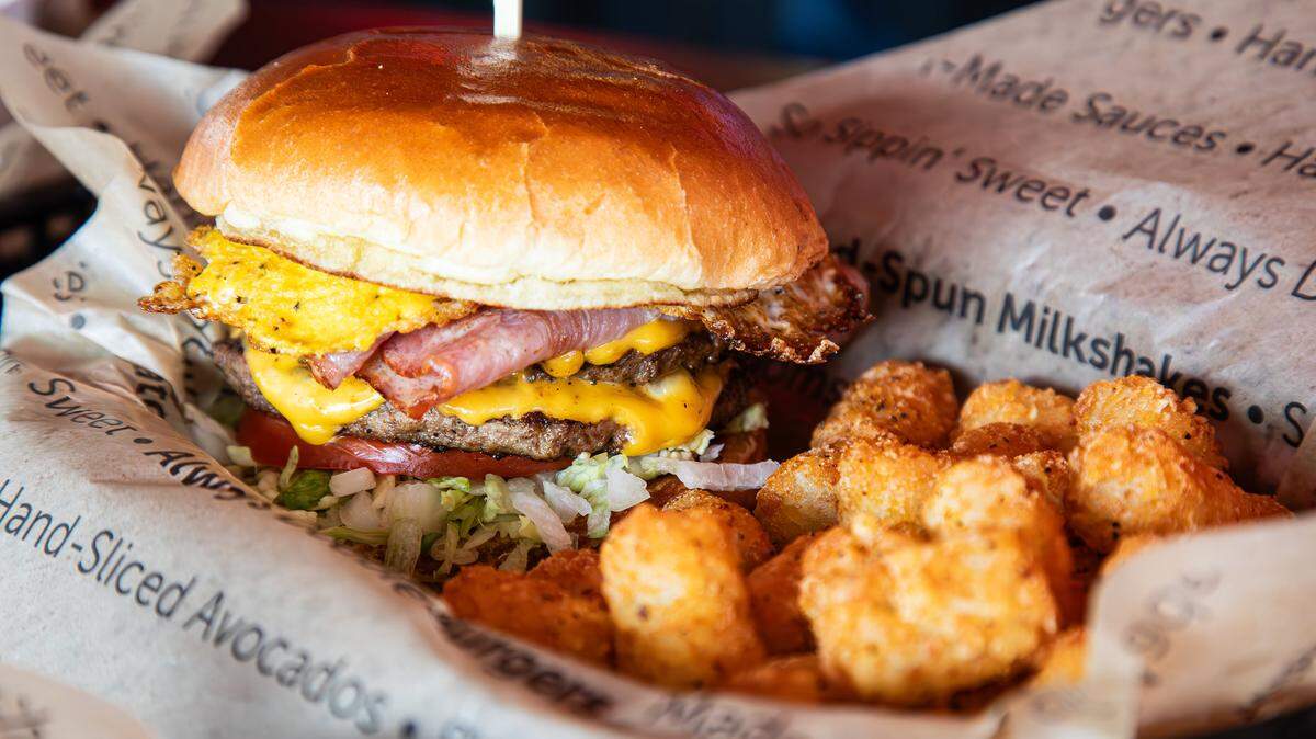 A new fast-casual restaurant coming to Raleigh serves items including ham and double-stacked cheeseburgers and tater tots.