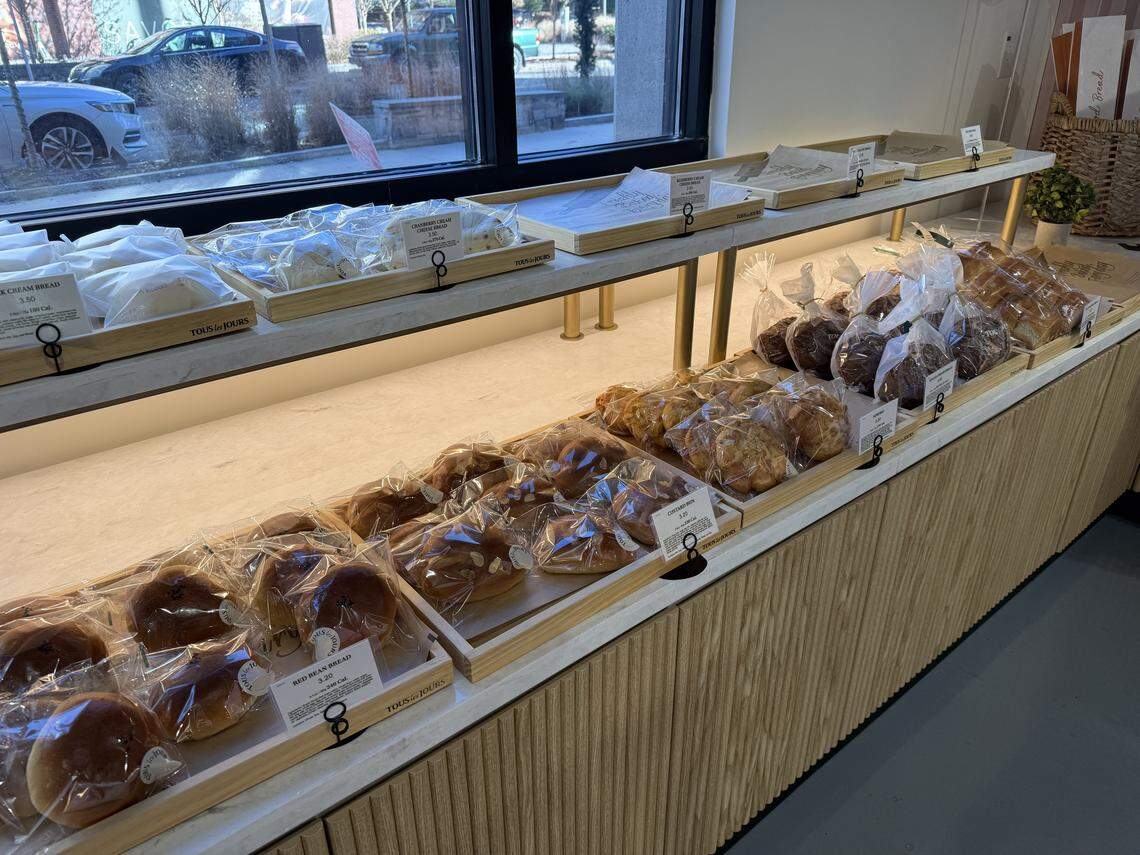 Breads and buns are packaged in the new Tous Les Jours bakery at Seaboard Station in Raleigh.