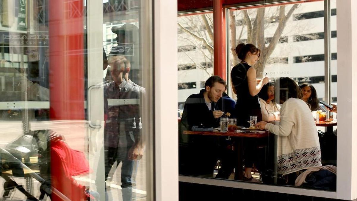 Guests enjoy brunch at Beasley’s Chicken + Honey in downtown Raleigh in March.