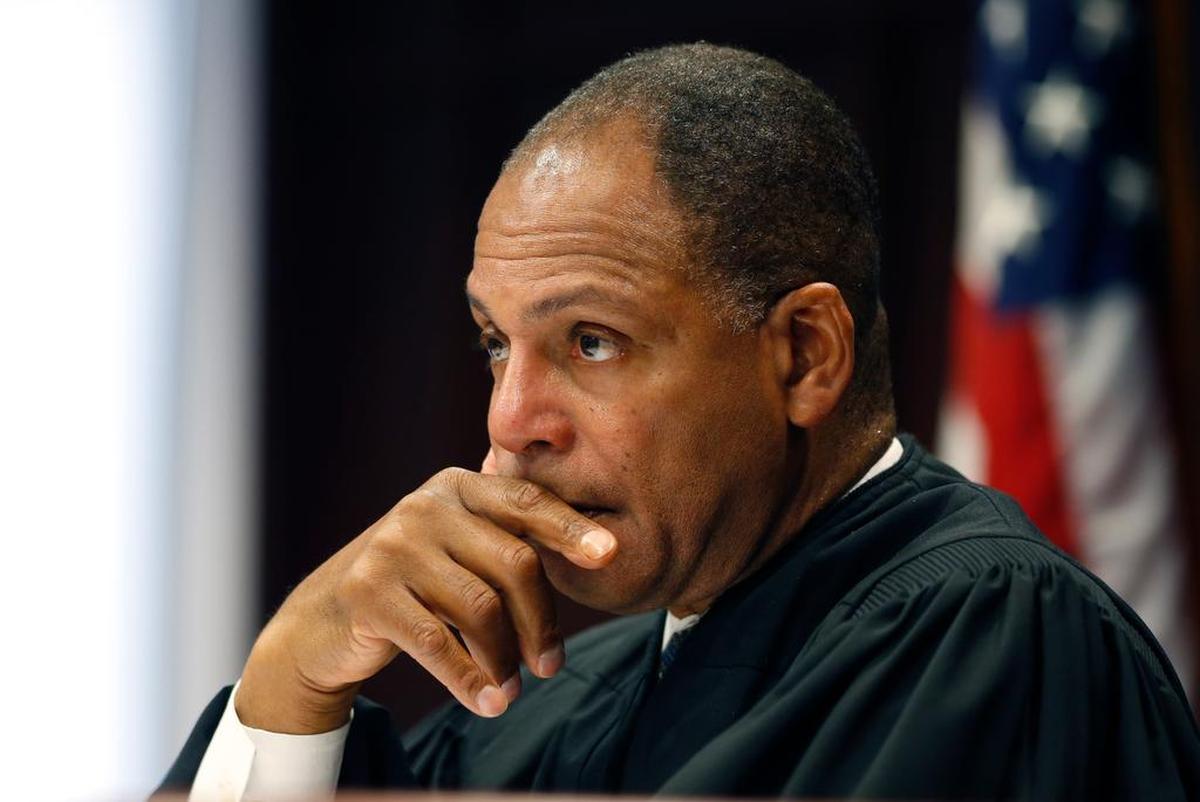 Superior Court Judge Carl Fox presides over a hearing in Wake County Superior Court in June 2014.