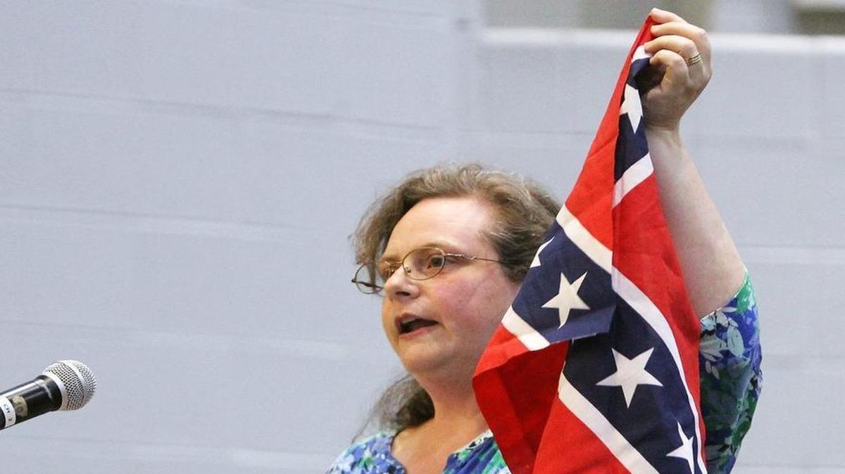 Hillsborough resident Katherine Switzer Walker urges the Orange County Board of Education to ban the Confederate flag on school system property.