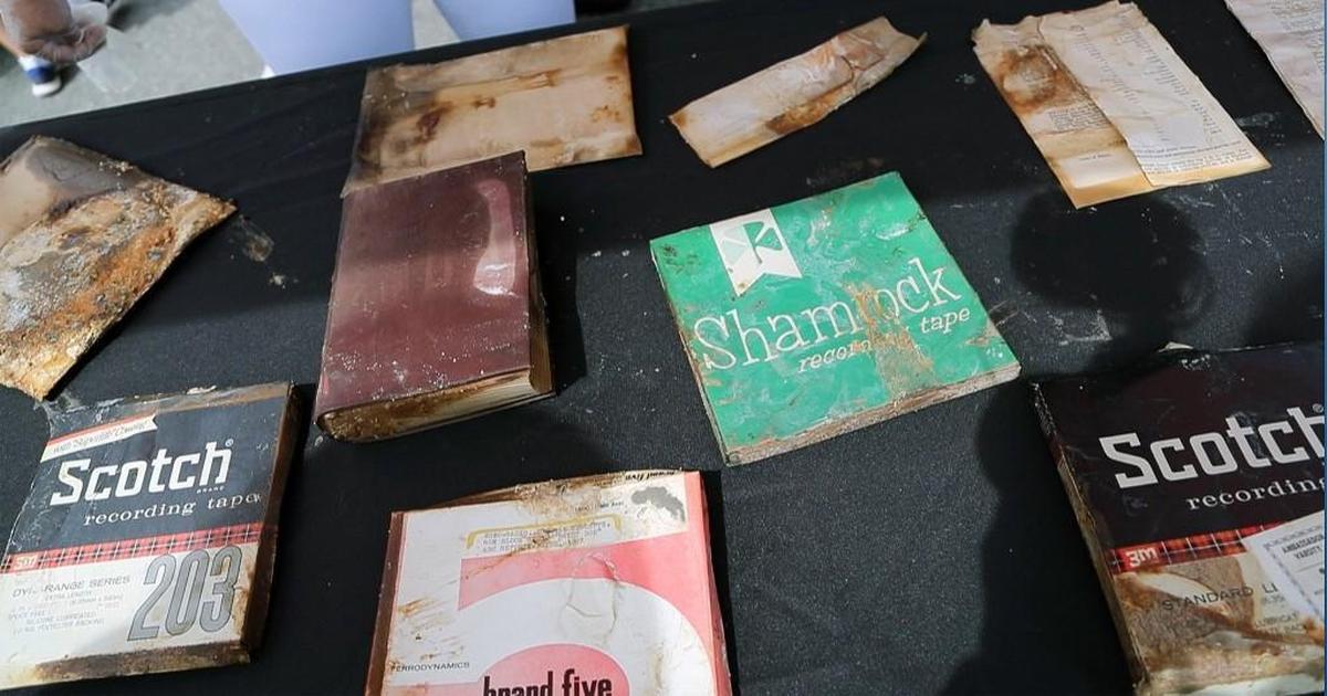 Some of the items that were pulled out of a the North Hills time capsule that was buried on June 8, 1967. It contained reel-to-reel tape, church bulletins and a News & Observer article, among other things.