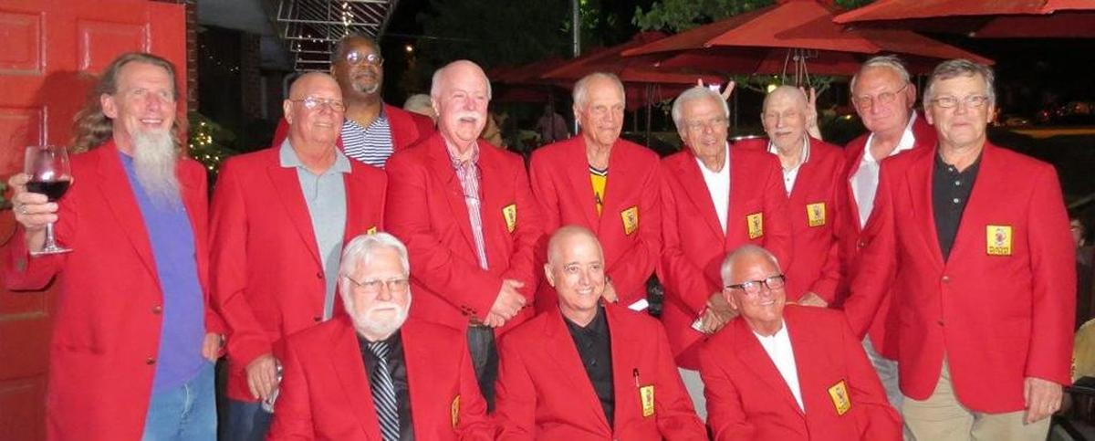 Robert McMillan, best-known as “Bert,” has retired after 21 years tending bar at The Player’s Retreat on Oberlin Road in Raleigh. Shown at top left, he is the only employee in the red-jacketed ranks of the Hall of Fame.