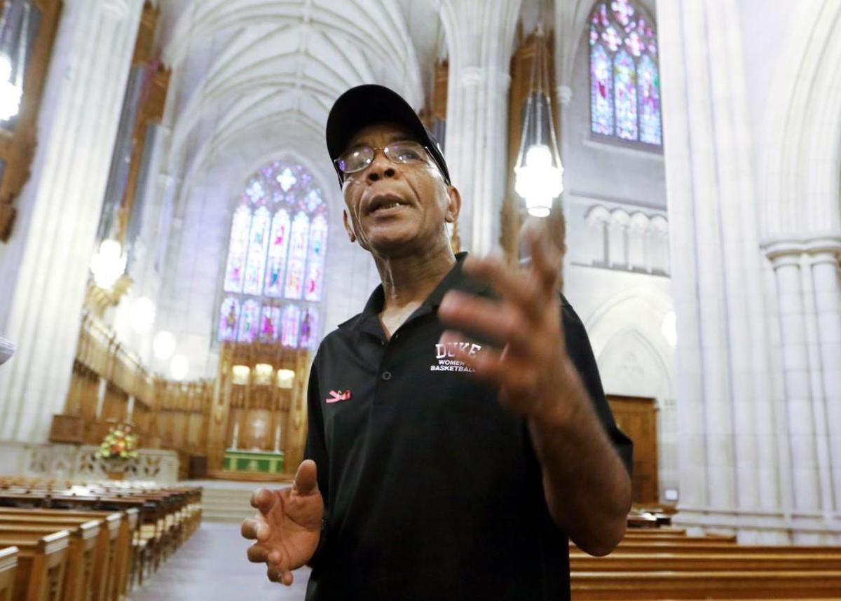 Duke Chapel custodian Oscar Dantzler, 65, looks up Wednesday to the soaring height of the chapel to bring back memories of many of the fine people and events he had served over his 19 years as custodian of the historic ca. 1930 chapel on the grounds of Duke University west campus in Durham, NC. Dantzler will be one of two honorees the next day to be awarded the University Medal at Duke University’s Founders Day ceremony in Duke Chapel.