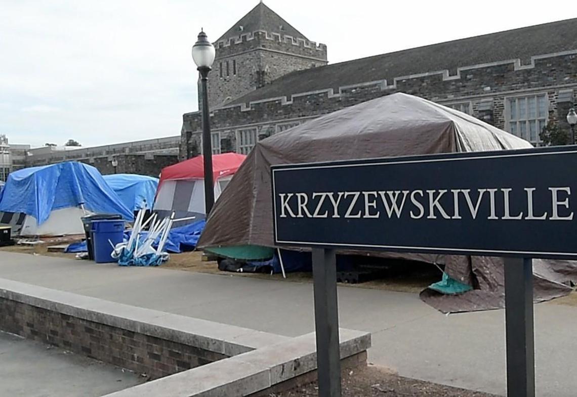 A plaque designates Duke’s official Krzyzewskiville tenting site.