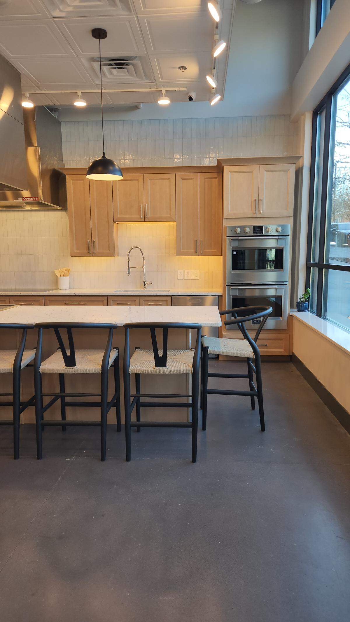 There are multiple stations for cooking classes and demonstrations at Hone-Sharpen, a new business at Smoky Hollow in downtown Raleigh.