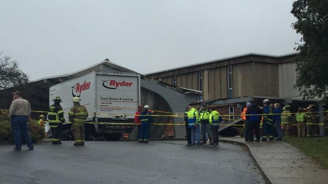 
Emergency workers at the scene of a collapsed concrete awning at North Iredell high in Statesville.
