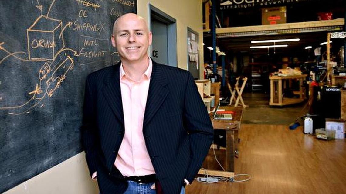 
Tom Ryan, the Kauffman Foundation Entrepreneur in Residence, stands inside Outrider USA in Fletcher, one of the start-ups he helps to mentor, in April. He has started a podcast as part of his mission to help entrepreneurs.
