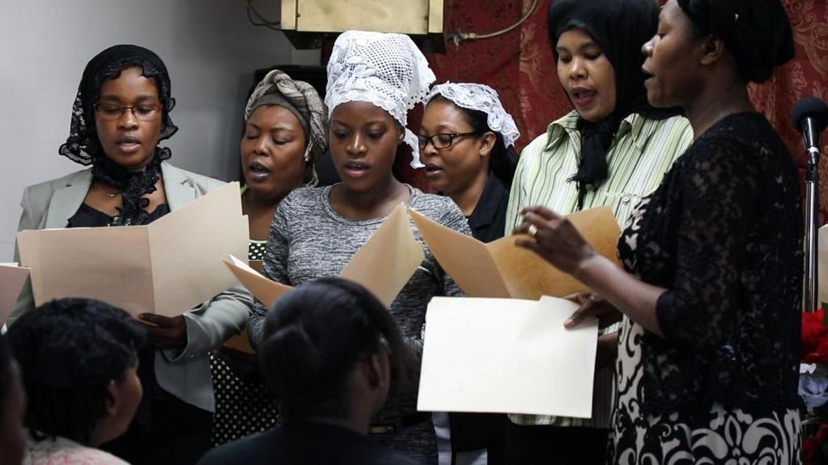 Congregants perform songs for the "first Sunday" service at the First Haitian Baptist Church in Mt. Olive on Sept. 3, 2017.