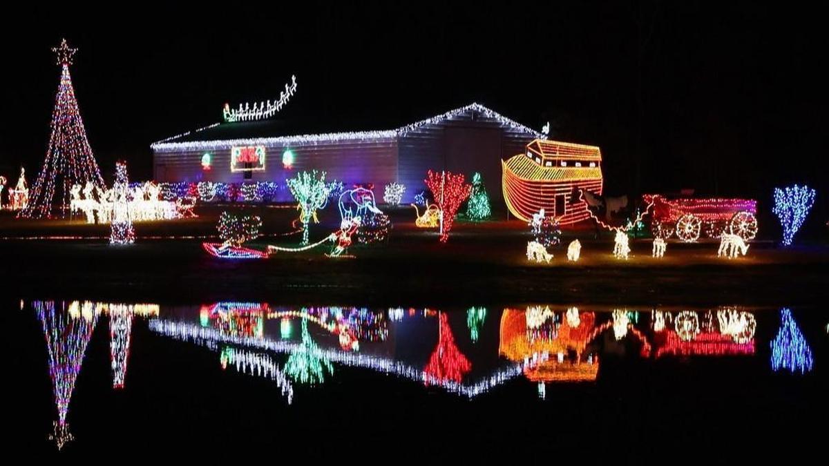 Christmas decorations shimmer off the pond at Piper’s Lights display at 5685 Fixit Shop Rd. in Wake Forest.