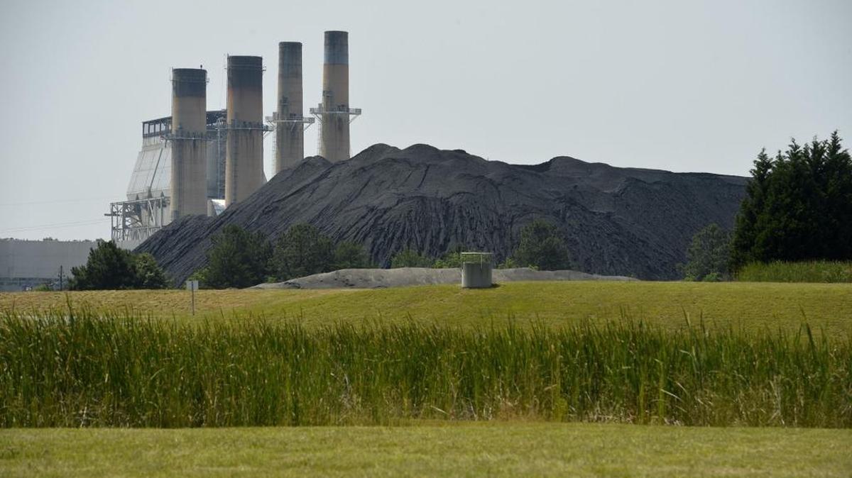 A mountain of coal is piled next to Duke Energy's Marshall Steam Station on Lake Norman. Ash produced when coal is burned can contaminate water, but it’s also a useful ingredient in products such as concrete.