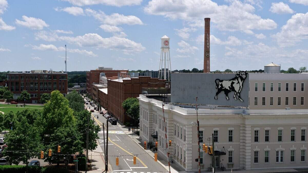 https://www.newsobserver.com/public/news/local/tbyag1/picture316615400/alternates/LANDSCAPE_1200/RAL_061825-DURHAM-SKYLINE-KLM-04.JPG