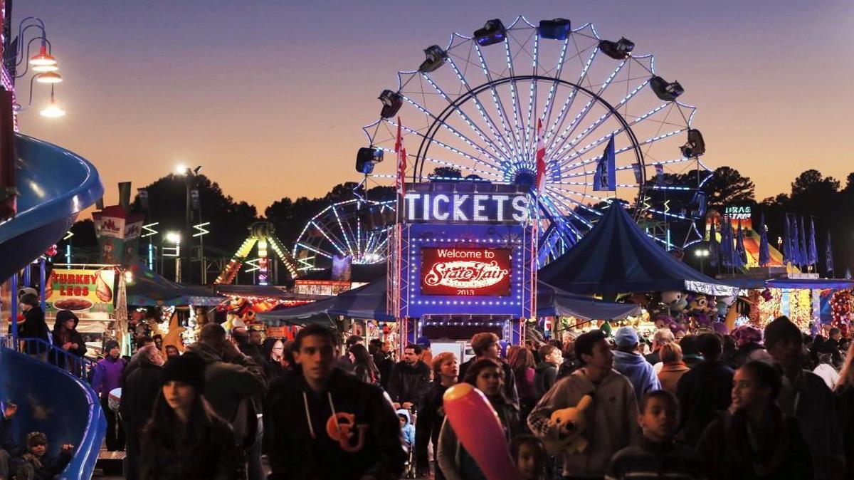 The sun sets during the N.C. State Fair in Raleigh.