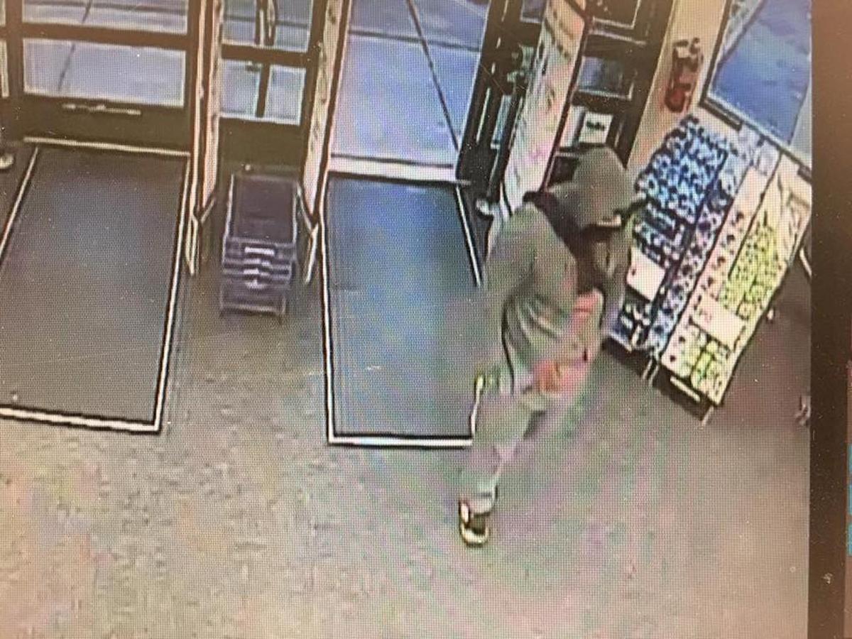 Wake Forest Police responded to an armed robbery call Sunday, Feb. 18, 2018 at the Walgreens on 3601 Rogers Road. The suspect is described to be a male between 5 feet 6 inches and 5 feet 10 inches tall, weighs about 200 pounds, has a beard and speaks with a Middle Eastern accent. He wore an olive green hooded sweatshirt with a red design on the front, his sneakers were white and black and he wore a cloth that partially covered is lower face.