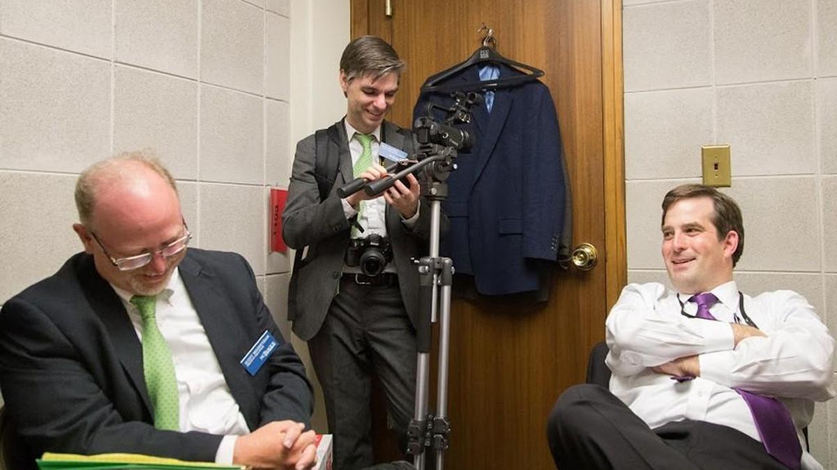 Recently appointed Insider editor Mark Binker (right) jokes with former Insider employees Benjamin Brown (center) and Scott Mooneyham in the Insider office at the North Carolina General Assembly on March 29, 2017.