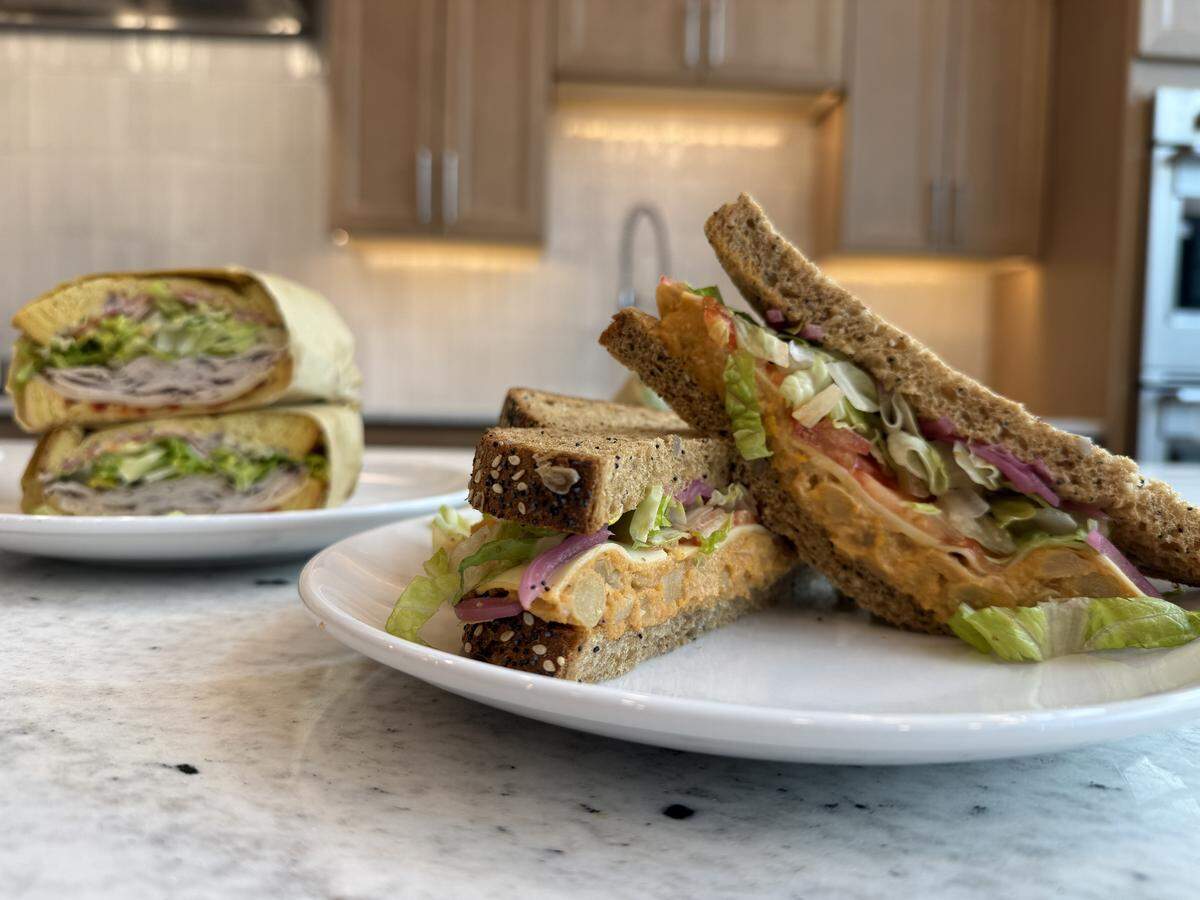 The vegetarian chickpea salad sandwich from Garlic Bay is served on seeded bread.