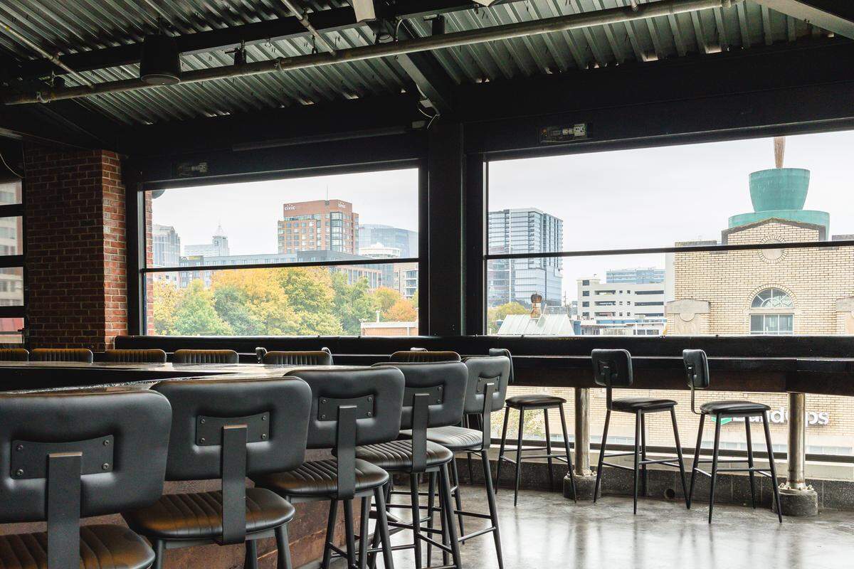 The 9,600-square-foot Smash Social Club opening in Raleigh, N.C., will offer handcrafted cocktails and bar food including wings and pizza.