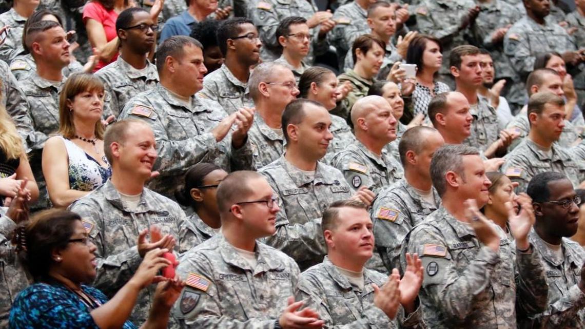 Active duty NC National Guard guardsmen and family members stood and applauded as the World War II 30th Infantry Division veterans entered for a ceremony Friday, July 24, 2015 in the NCNG Joint Force Headquarters in west Raleigh, NC. About 20 WWII 30th Infantry Division veterans and their families were honored Friday for the 70th year anniversary "Old Hickory" Veteran Recognition Day.