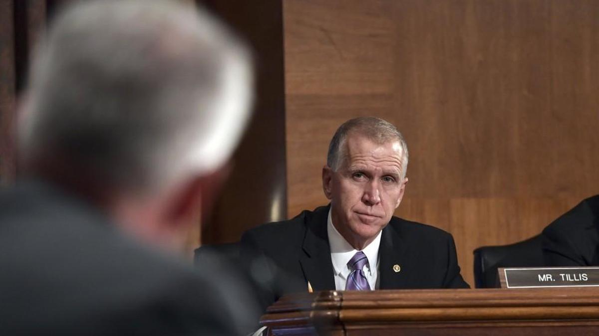 Sen. Thom Tillis listens as Wells Fargo Chief Executive Officer and President Timothy Sloan testifies before the Senate Committee on Banking, Housing and Urban Affairs on Capitol Hill in Washington, Tuesday, Oct. 3, 2017.