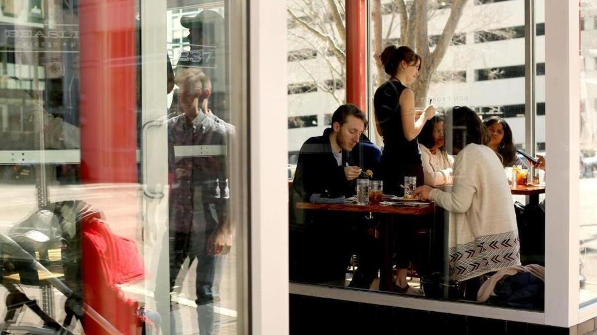 Guests enjoy brunch at Beasley’s Chicken + Honey in downtown Raleigh on Sunday, March 5, 2017. A U.S. labor department rule change proposal could give employers more control over the tips earned by bartenders, restaurant workers and others paid at least $7.25 an hour.