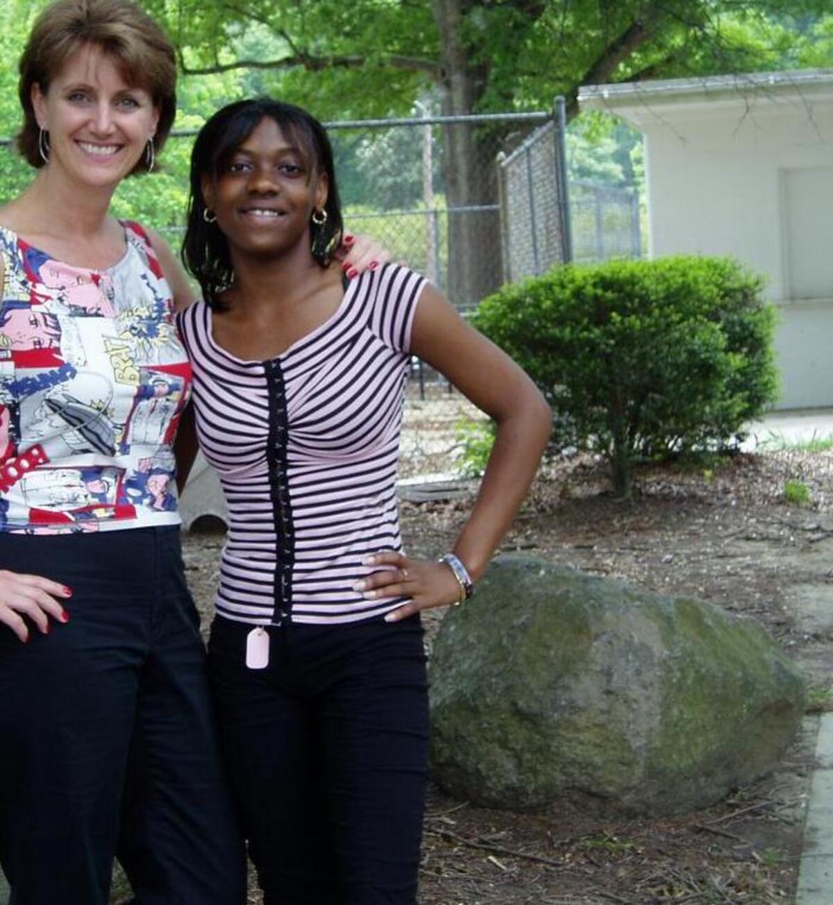 Julie Lewis, left, and her “little sister,” Ladrian, were paired by Big Brothers Big Sisters when Ladrian was 13.
