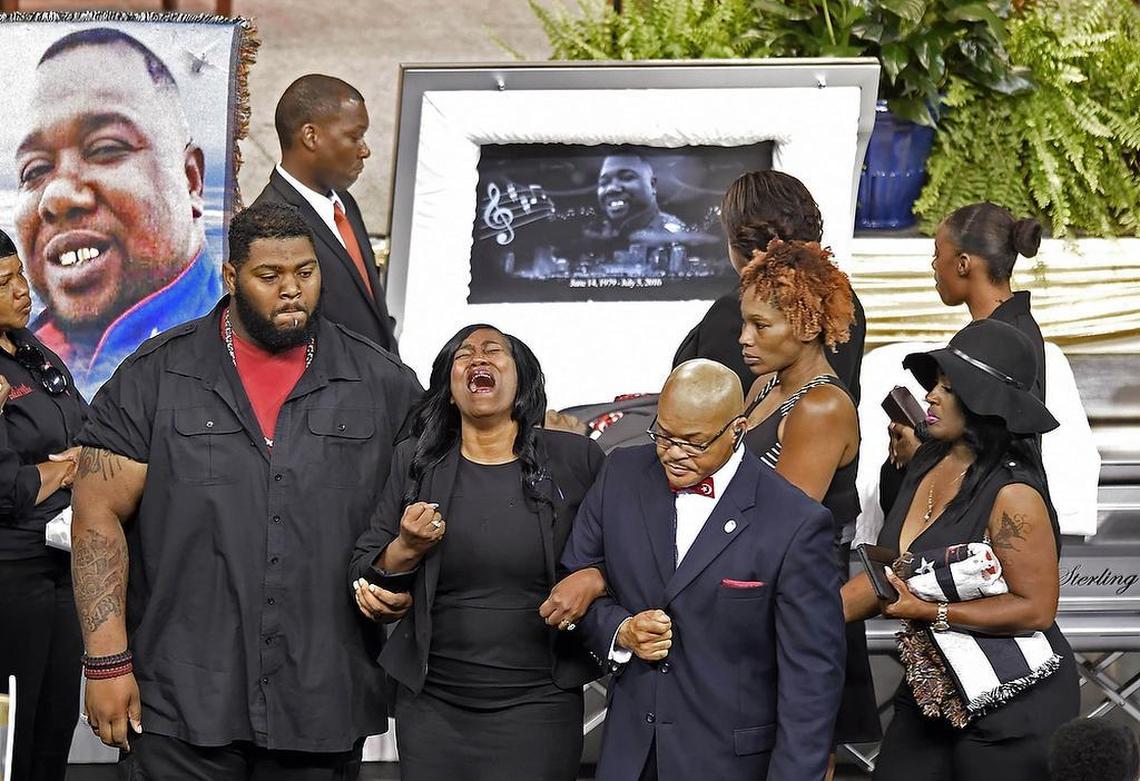 Sandra Sterling, an aunt who helped raise Alton Sterling, sobs as she is helped away from the casket during visitation before the funeral service fot Sterling at the F.G. Clark Activity Center in Baton Rouge, La., Friday, July 15, 2016. Sterling was shot July 5 outside a Baton Rouge convenience store in an encounter with police that was caught on video.