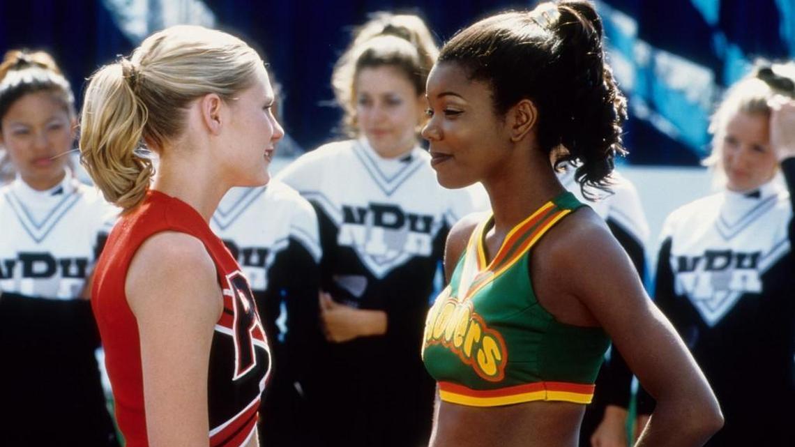 Peyton Reed, a Raleigh native and UNC alumnus directed 2000’s “Bring It On,” a popular movie about rival cheerleader squads starring Kirsten Dunst, left, and Gabrielle Union.