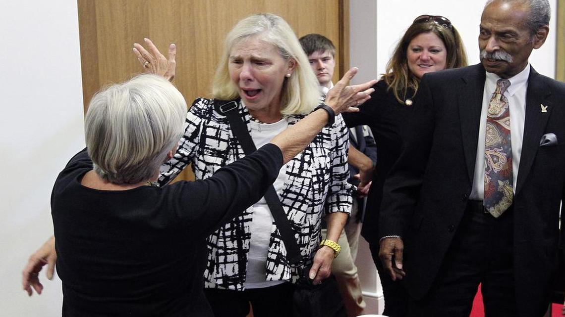 State Rep. Becky Carney of Charlotte, second from left, is greeted by Rep. Gale Adcock, left, and Rep. Mickey Michaux, right, as she made her first appearance on the N.C. House floor after open heart surgery in 2015. Carney announced Wednesday that she has been diagnosed with breast cancer.