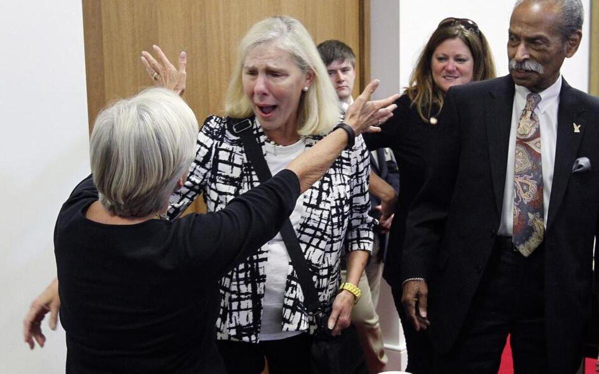 State Rep. Becky Carney of Charlotte, second from left, is greeted by Rep. Gale Adcock, left, and Rep. Mickey Michaux, right, as she made her first appearance on the N.C. House floor after open heart surgery in 2015. Carney announced Wednesday that she has been diagnosed with breast cancer.