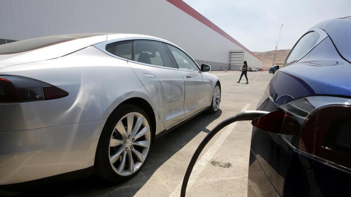 Tesla Motors model S cars are charged at the a Tesla Gigafactory in 2016 in Sparks, Nev. A $50 million lithium-ion battery factory is being proposed for Philipsburg and would be the first such factory in the state.