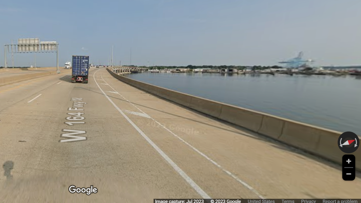 Two people are dead after they were thrown over a bridge in a motorcycle crash.