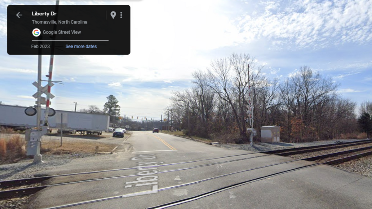 The teenager was watching another train go by when he was hit by the Amtrak train, North Carolina police said.