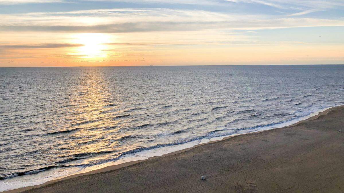 A missing 52-year-old woman has been found dead three miles off the Virginia Beach oceanfront a month after she disappeared, police said.