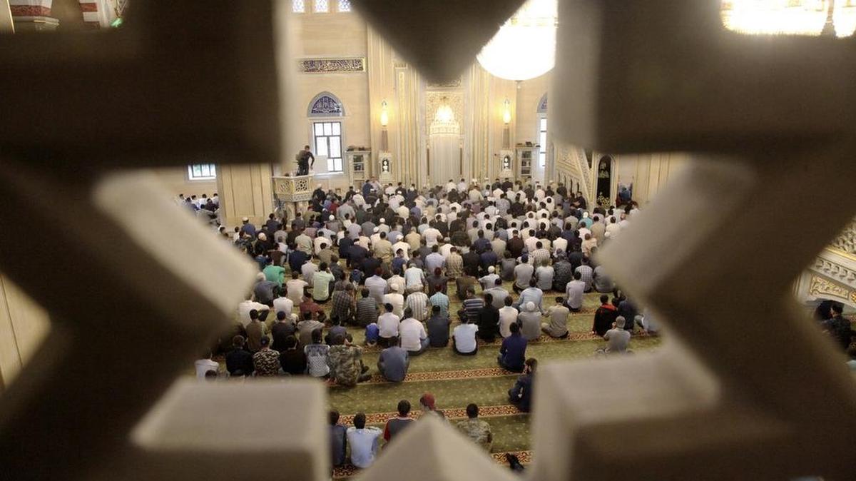 Chechen Muslims pray in a mosque during the Islamic holiday of Eid al-Adha in Chechen regional capital of Grozny, Russia, in 2016.
On Monday, a Wright City, Mo., man pleaded guilty to hate crimes after threatening to "behead" and "bomb" Muslims worshiping in a Goergia mosque.