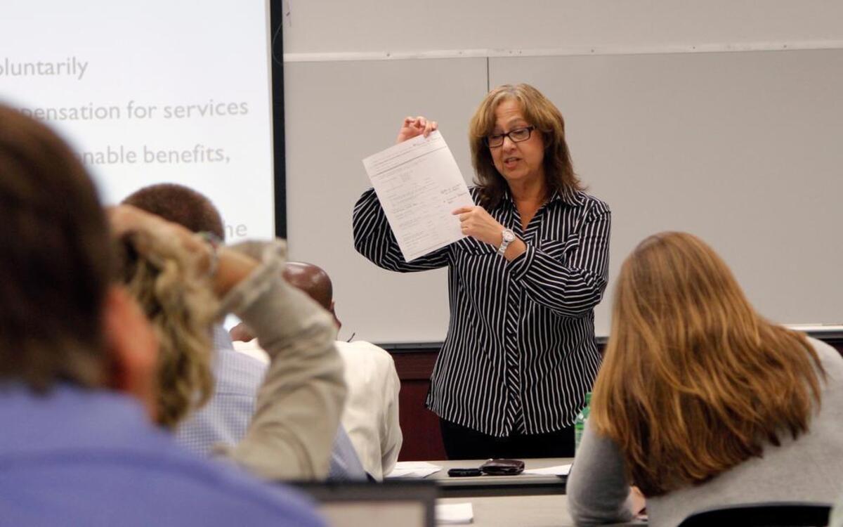 
Labor relations officer from HUD Dondra Merrell leads a training seminar for local government officials on how to verify workers are paid properly on federally funded housing projects at the Herb Young Center in Cary in this May 14, 2014, file photo.
