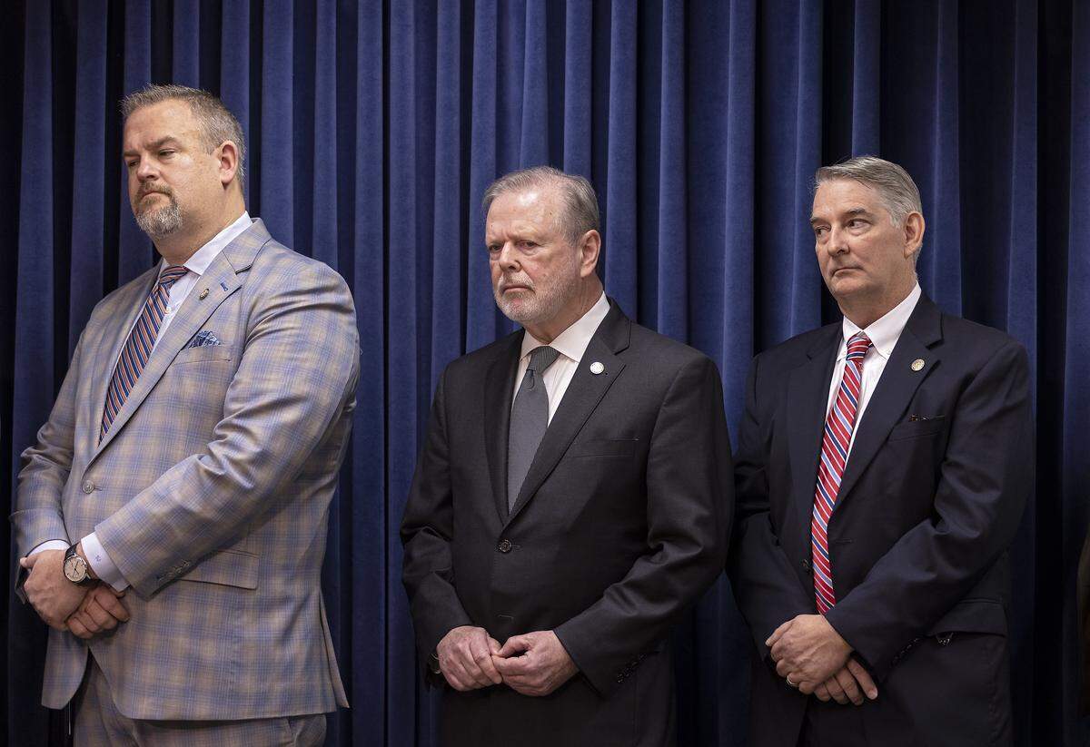 From left, Sen. Todd Johnson, Sen. Phil Berger and Sen. Buck Newton listen during a press conference held by N.C. Senate Republicans about the Parents’ Bill of Rights legislation on Wednesday, Feb. 1, 2023, in Raleigh, N.C.