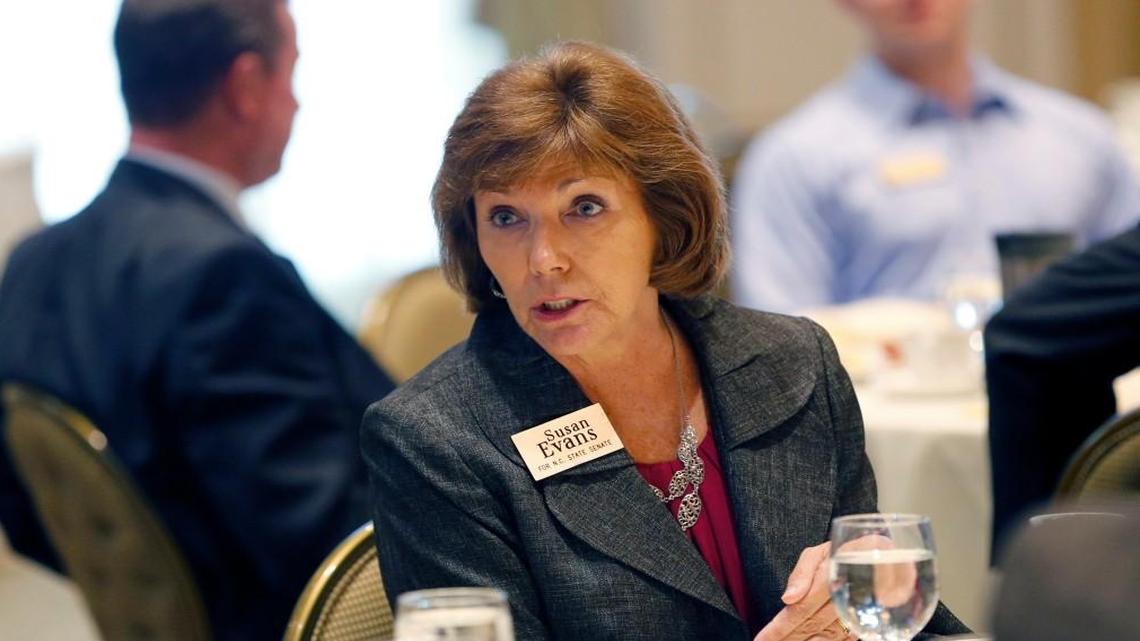 Susan Evans, who is running for the N.C. Senate, talks with attendees at a forum for candidates for state legislative races held at Prestonwood Country Club in Cary, NC on Sept. 28, 2016.