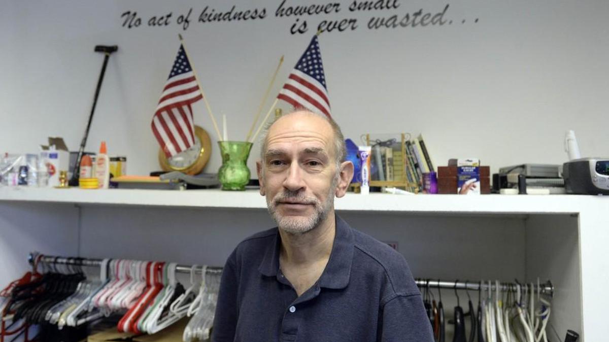 Tim Messenger, who volunteers at the Camino Community Center Thrift Store and lives for free in the office, remains uninsured after being laid off from his job in 2014. He falls into the “Medicaid gap” that resulted from the state’s decision not to expand Medicaid under the Affordable Care Act.