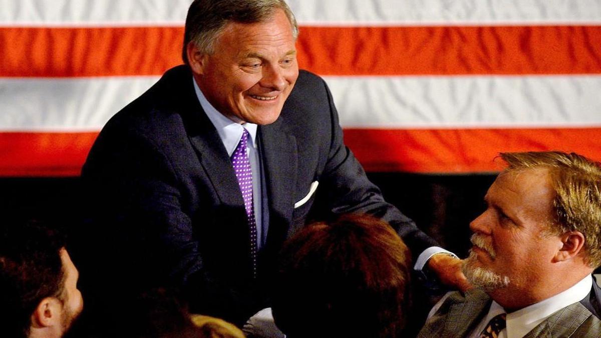 NC Senator Richard Burr embraces supporters following his victory speech at the Forsyth Country Club in Winston-Salem, NC on Tuesday, November 8, 2016. Burr defeated Deborah Ross.