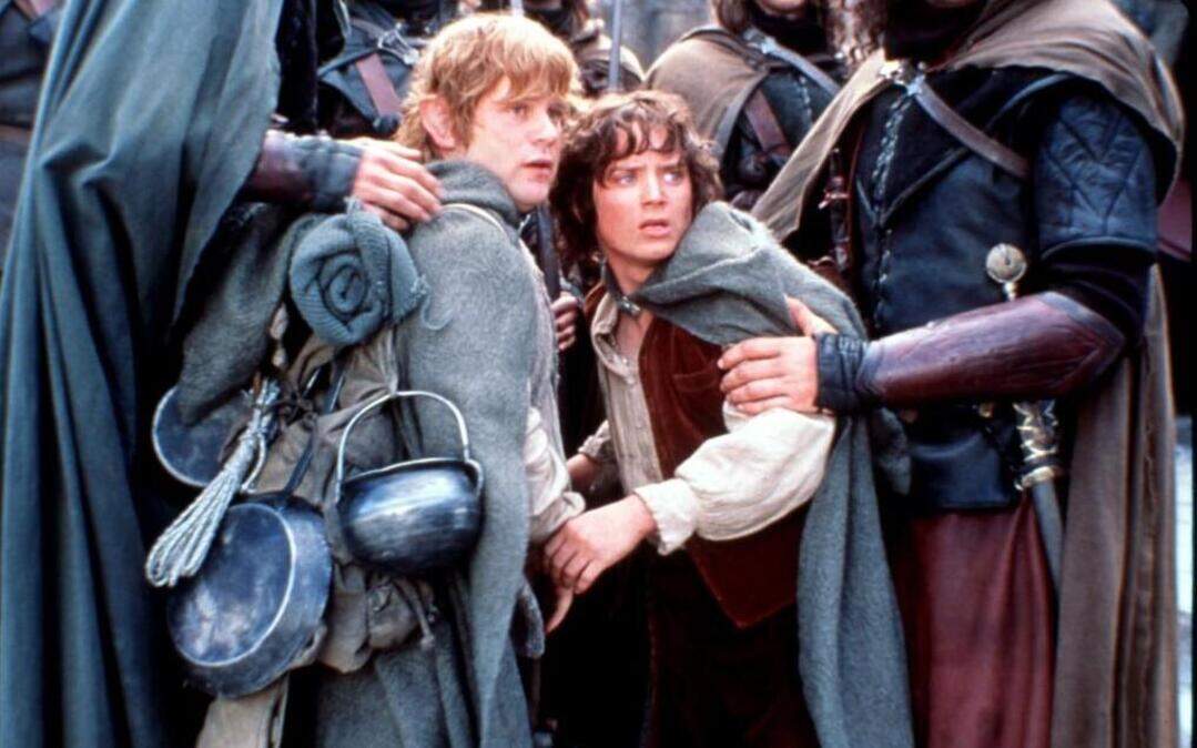 Actors Sean Astin, left, as Sam, and Elijah Wood, as Frodo, appear in a scene from "The Lord of The Rings: The Two Towers," in this undated promotional photo.