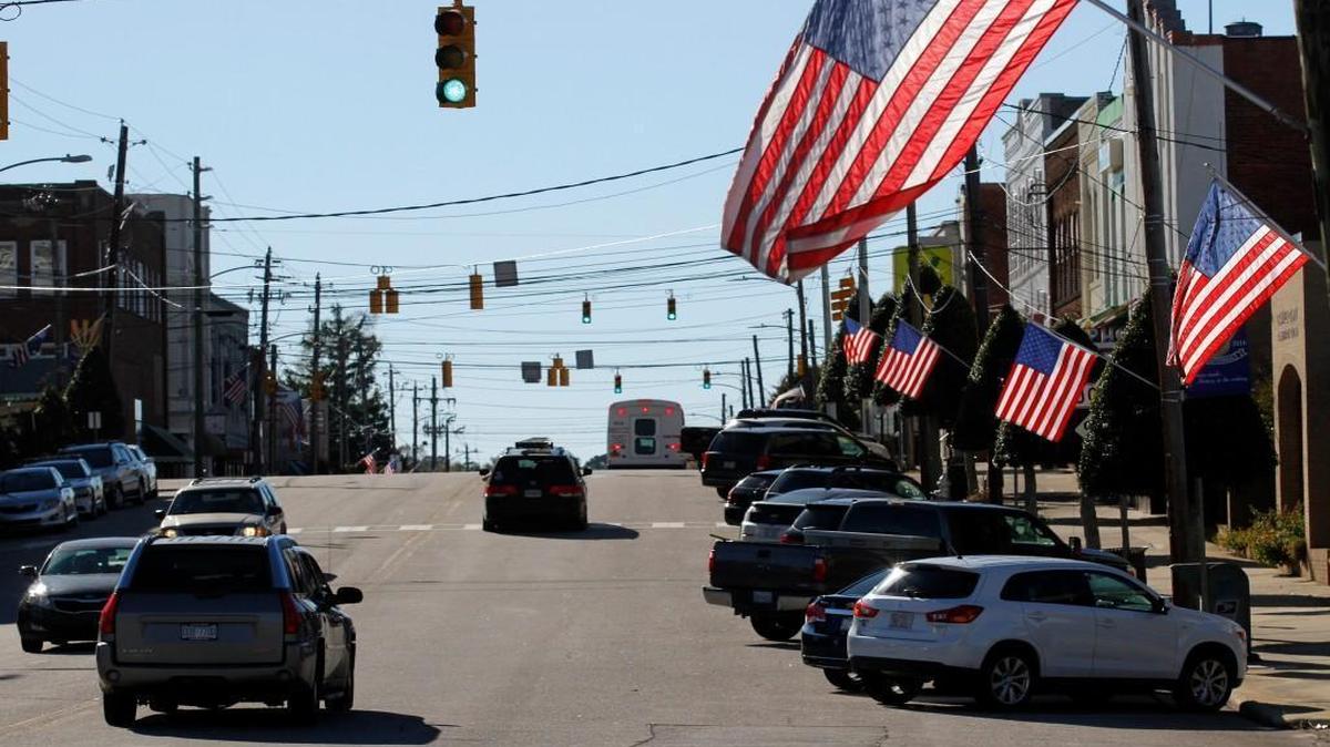 Flags fly over Hillsborough Street in downtown Oxford in Granville County, one of several North Carolina counties that flipped from voting for Obama in 2012 to voting for Donald Trump this year.