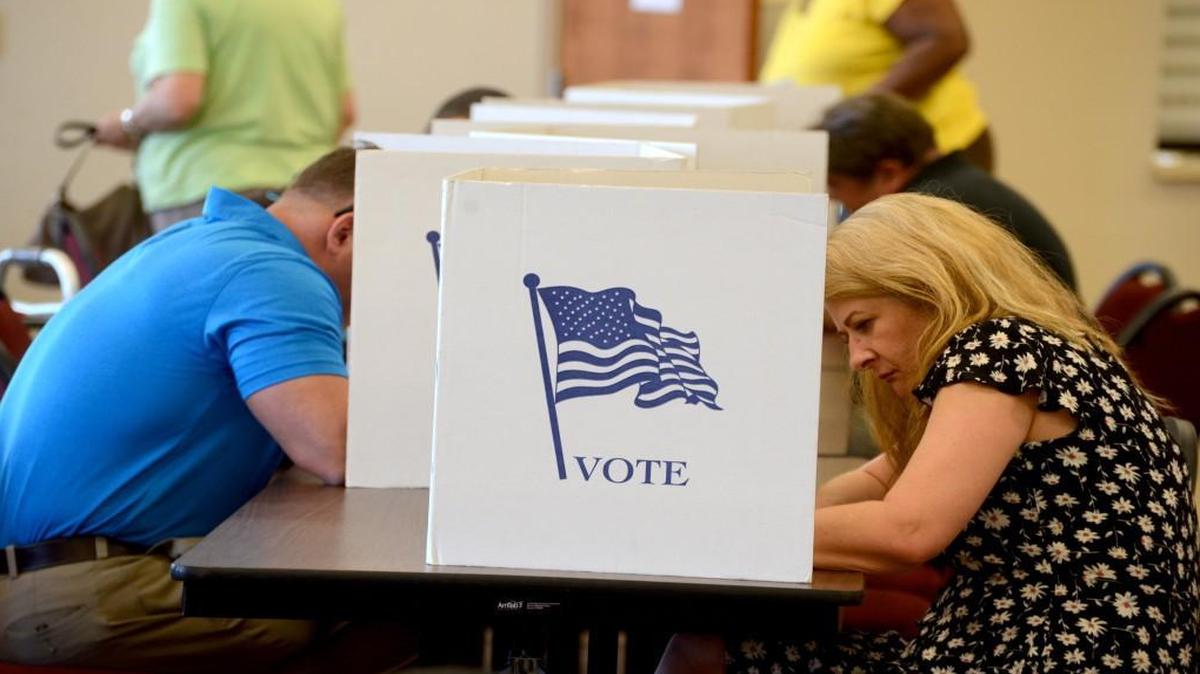 Voters fill out their ballots at Oakland Presbyterian Church in Johnston County’s Cleveland community.