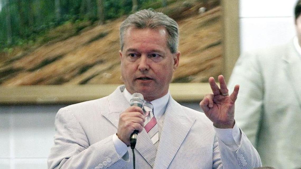 Rep. Chris Malone speaks on the state House floor in 2013.