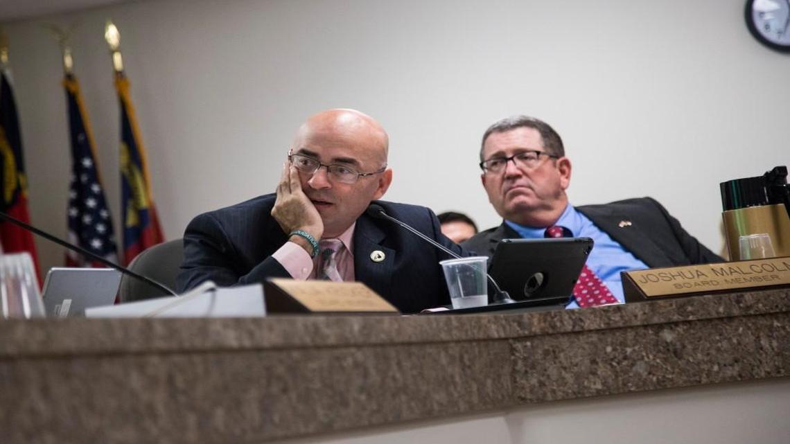 State Board of Elections members Joshua Malcolm, left, and A. Grant Whitney Jr. during a meeting Thursday, September 8, 2016 at the State Board of Elections in Raleigh.