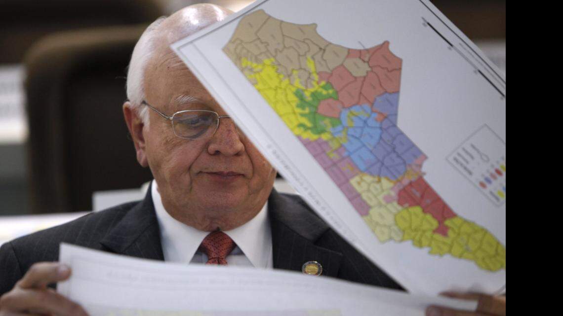 
Rep. John Faircloth checks maps during a meeting of joint redistricting committees Monday, Nov. 7, 2011. North Carolina lawmakers returned for a special legislative session Monday.
