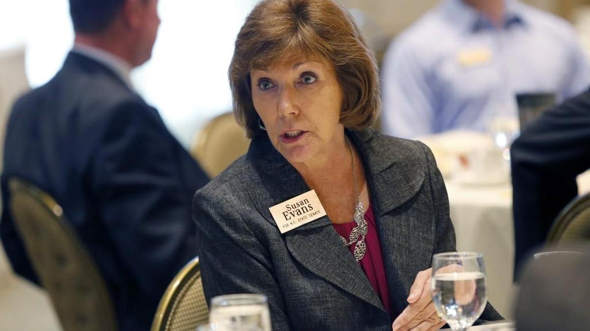 Susan Evans, who ran for the N.C. Senate, talks with attendees at a forum for candidates for state legislative races held at Prestonwood Country Club in Cary, NC on Sept. 28, 2016.