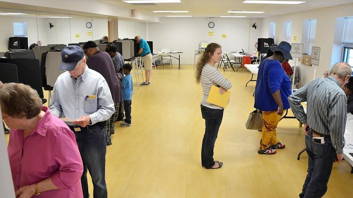 Voters sign in, make their selections and cast their ballots for the primary election at the Zebulon Community Center polling place in Zebulon, N.C. Tuesday, March 15, 2016.